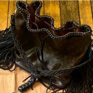 Louis Vuitton vintage boho bag original.  It’s so fabulous!!  Own a LV remade